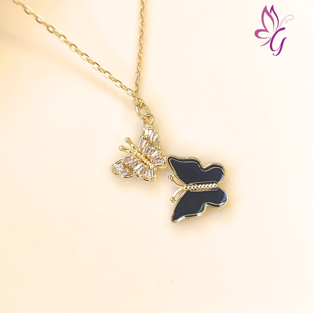 Collar de acero inoxidable con dije de maripos negra y blanca (GBR-ZIRC-I046-15G)